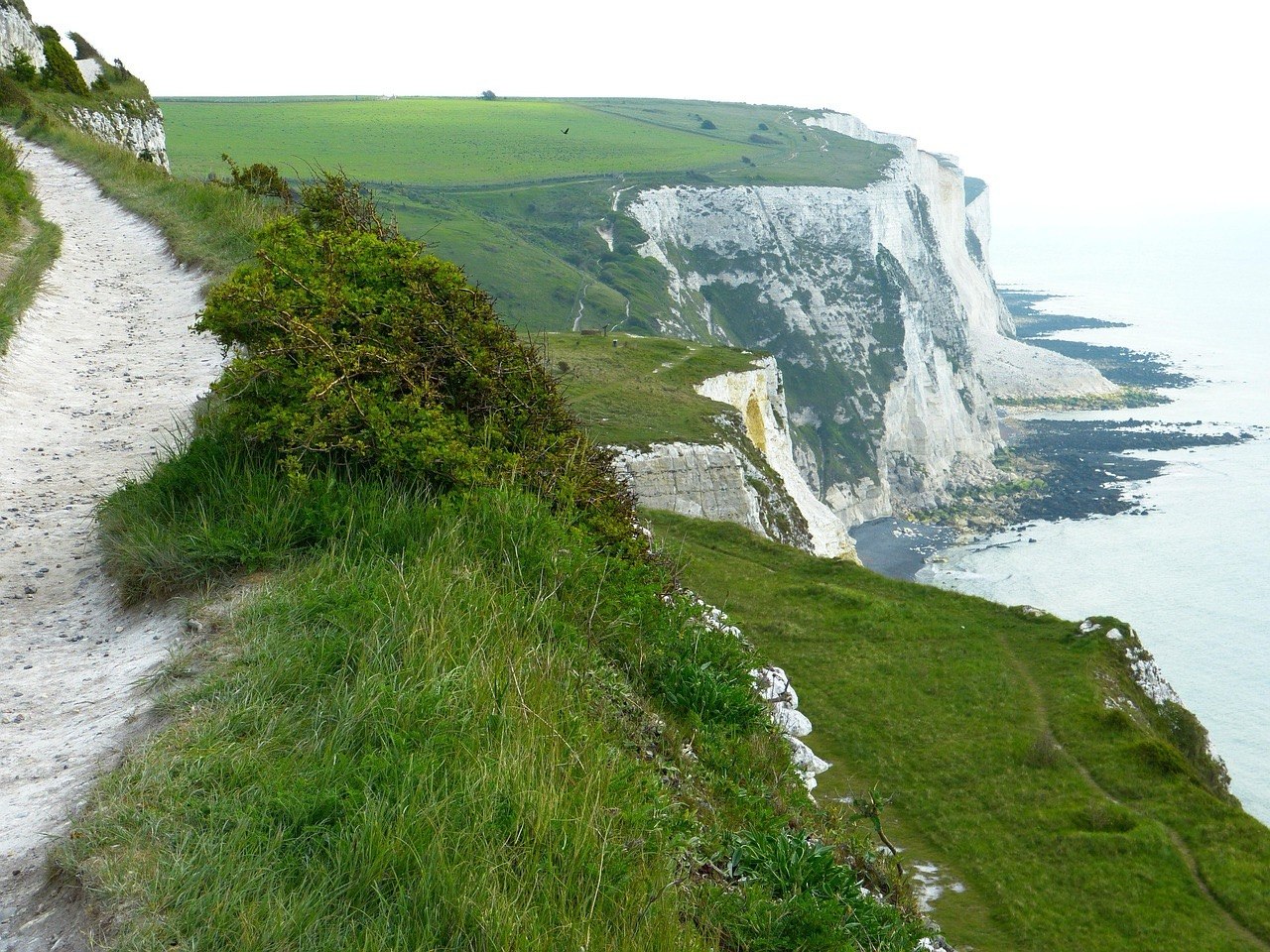 British Isles cruise featuring coastal cliffs, castles, and historic cities